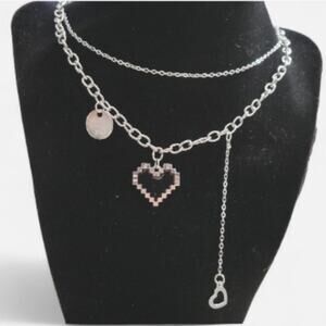 Asymmetric pixel heart necklace with "I love you" charm, silver and black